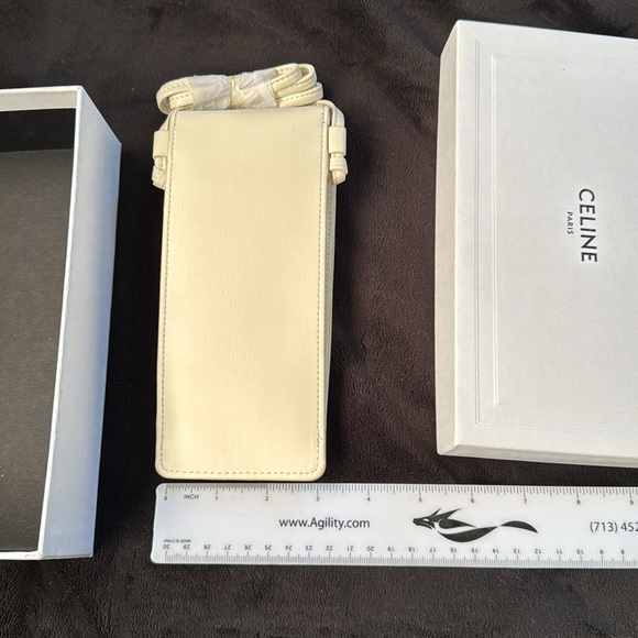 Sunglasses or phone holder crossbody bagNew without tagColor: Cream